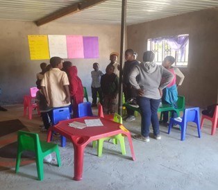 Children participating in indoor learning activities